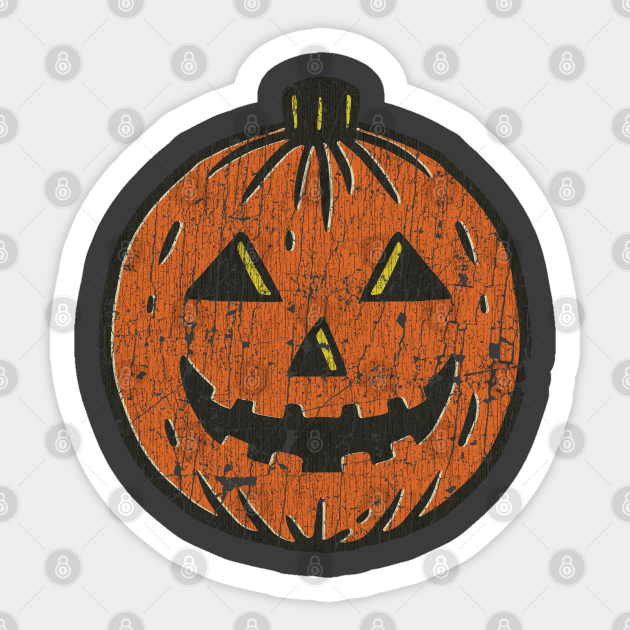 Vintage-style orange jack-o'-lantern sticker with distressed texture and black carved face, set in circular white border.