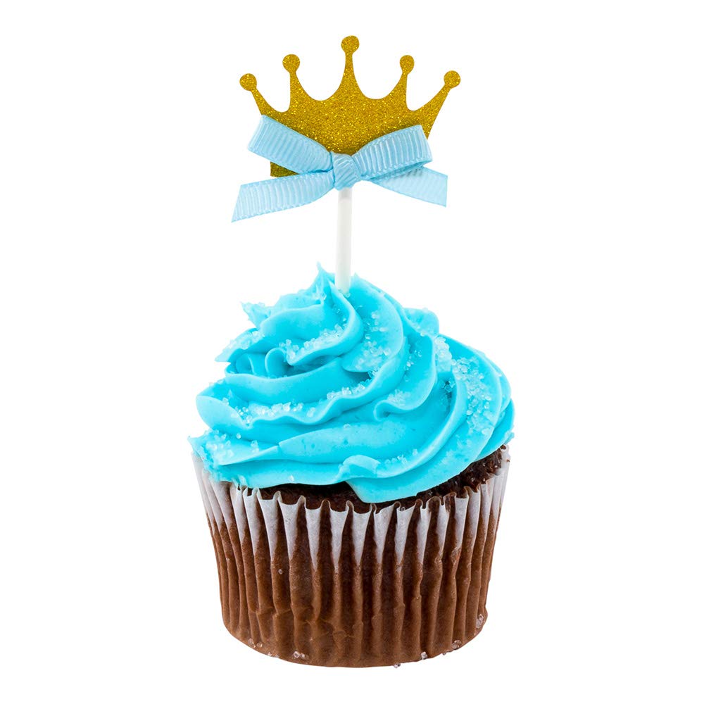 Chocolate cupcake with bright blue frosting, glittery gold crown topper, and light blue ribbon on a white background.