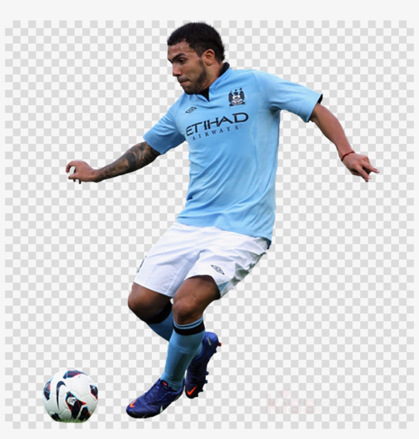 Manchester City player in light blue jersey dribbling a soccer ball during action.