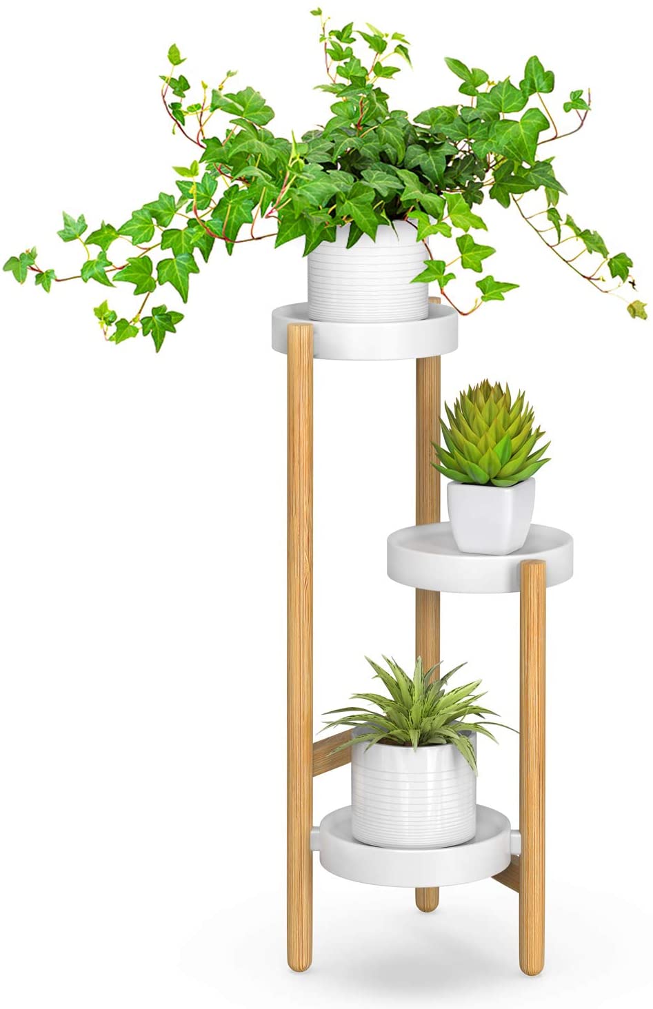 Modern three-tier bamboo and white plant stand holding ivy, succulent, and variegated plant in ceramic pots.