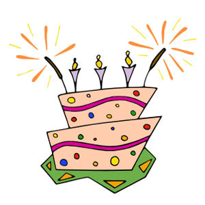 Two-tiered birthday cake with colorful polka dots, three lit candles, and festive sparklers on top.