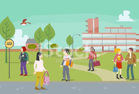 Diverse group of students walking on campus near a bus stop with trees and modern buildings in background.