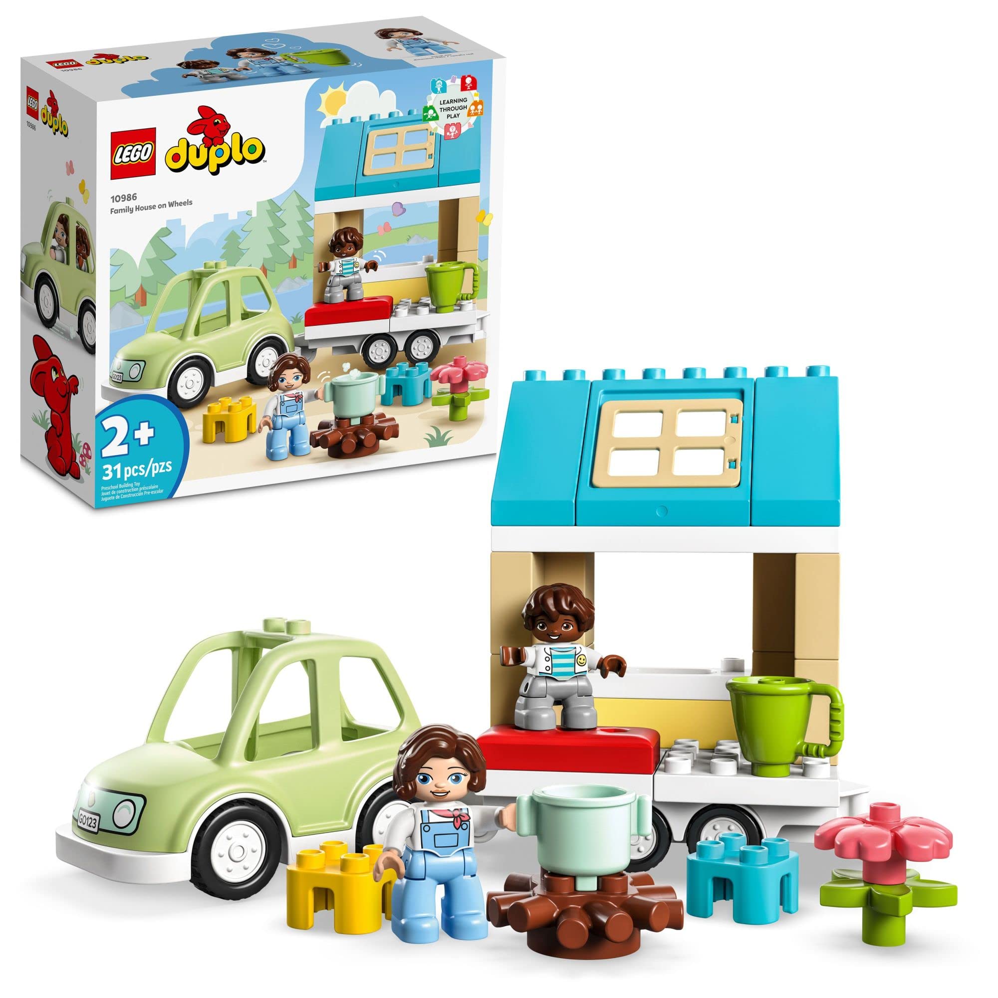 LEGO DUPLO 10986 Family House on Wheels set with green car, mobile home, two figures, and accessories for ages 2+.