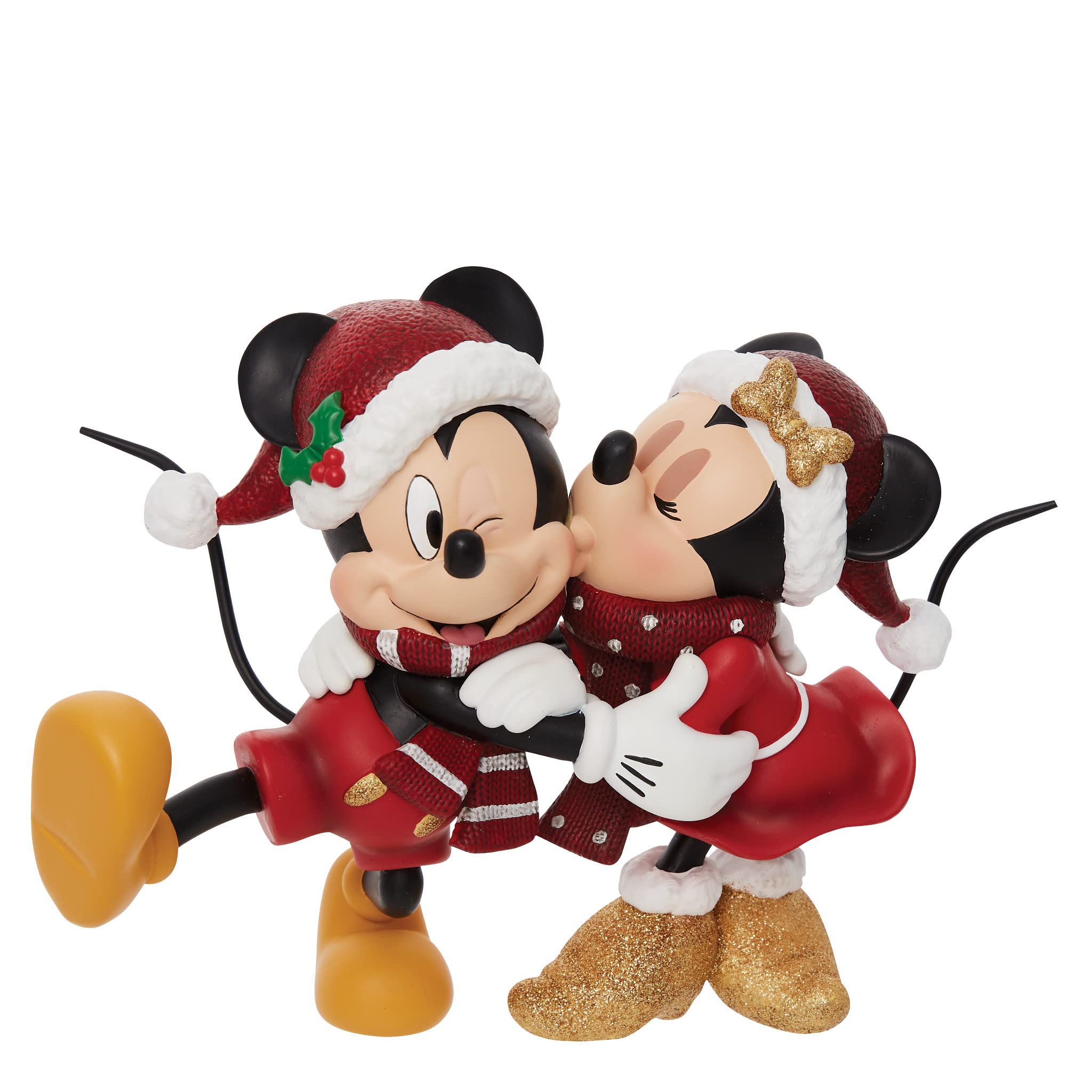 Mickey and Minnie Mouse in festive red Santa hats and scarves, sharing a joyful holiday hug with glittery gold boots.