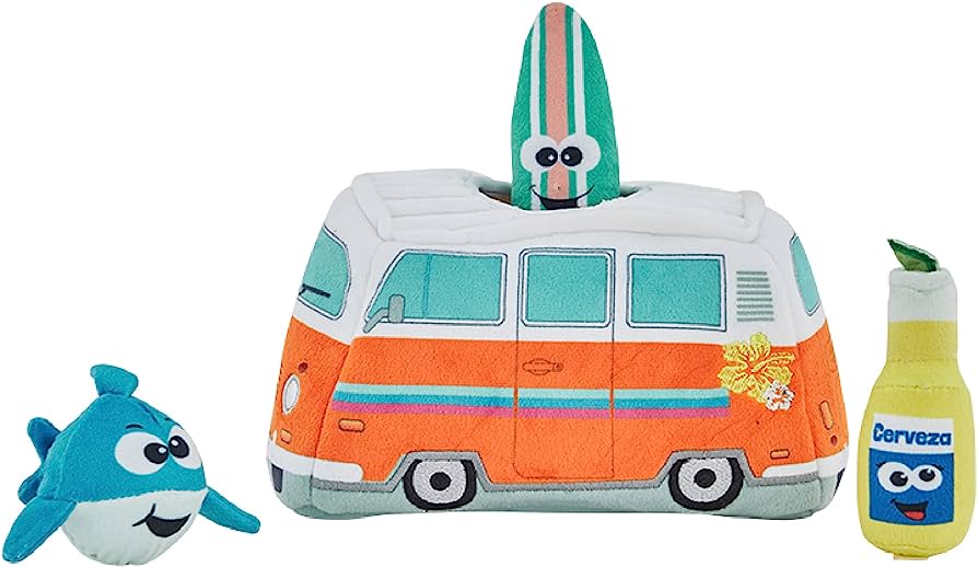 Plush toy set featuring a VW-style van with surfboard, smiling shark, and beer bottle character, all with cartoon faces.