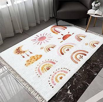 White kids' rug with colorful rainbows, suns, clouds, and stars; fringed edges on marble floor near window and chair.