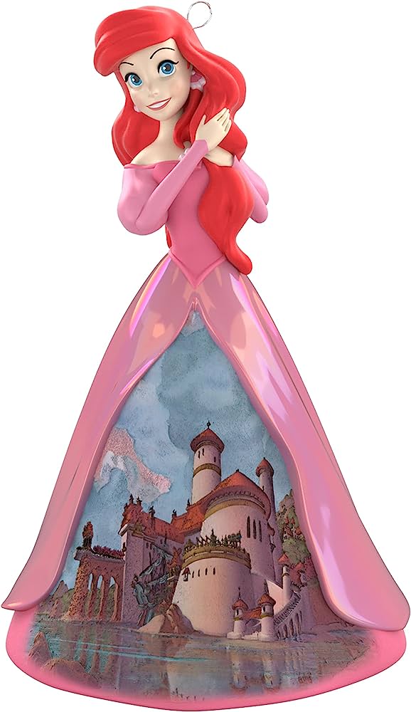 Disney Princess Ariel ornament with pink gown revealing a castle scene inside the skirt.
