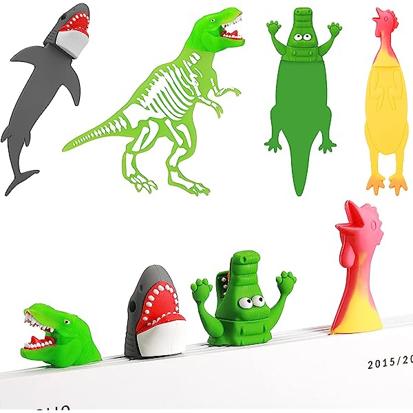 Colorful animal-shaped cable organizers including shark, T-Rex, crocodile, and chicken designs for desk management.