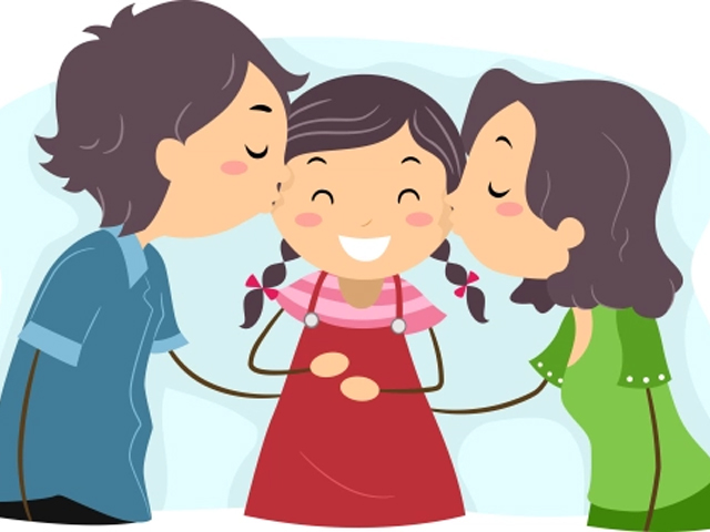 A smiling girl with pigtails is kissed on both cheeks by her parents in a warm, loving embrace.