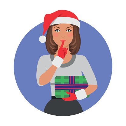 Woman in Santa hat holding wrapped gift with finger to lips, signaling secrecy or surprise.