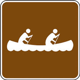 Brown sign with white icon of two people paddling a canoe.