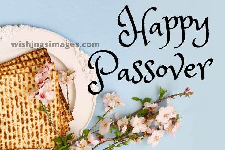 Matzah on a white plate with cherry blossoms and "Happy Passover" text on light blue background.