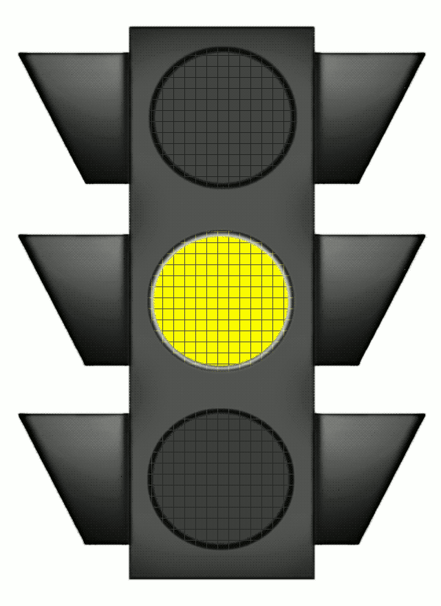 A vertical traffic light with the yellow (amber) light illuminated, indicating caution or prepare to stop.