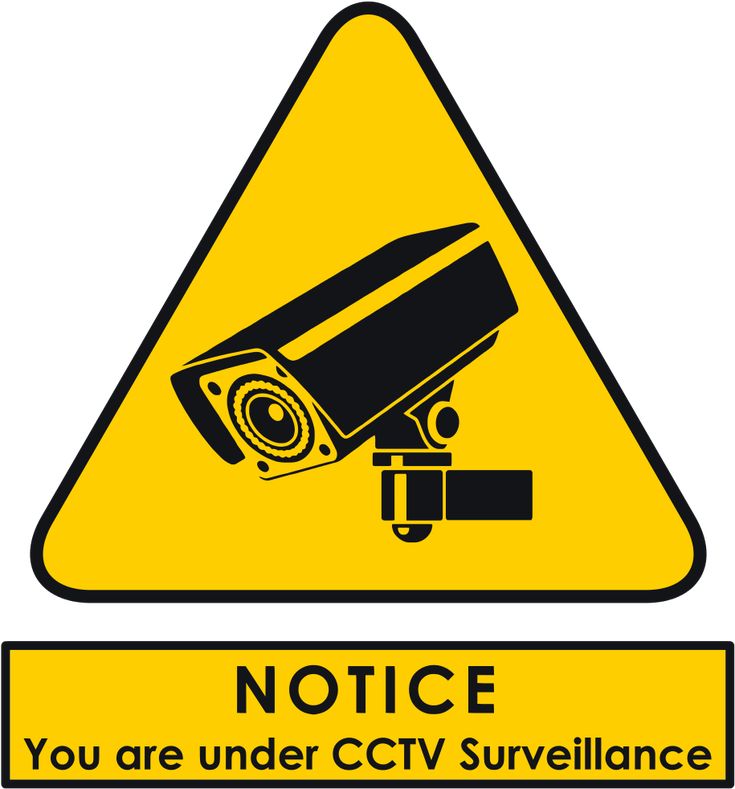 Yellow triangular warning sign with black CCTV camera icon and text "NOTICE: You are under CCTV Surveillance"