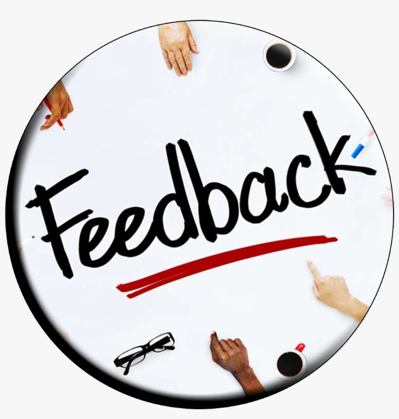 Circular white table with "Feedback" written in bold script, surrounded by diverse hands, coffee cups, glasses, and markers.