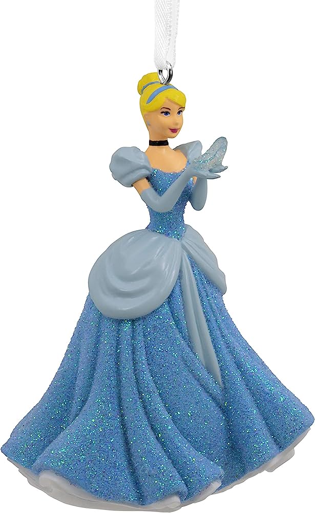 Disney Cinderella ornament in blue glitter gown holding glass slipper, hanging from white ribbon.