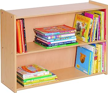 Light wood two-shelf bookcase filled with colorful children’s books, organized by size and theme.