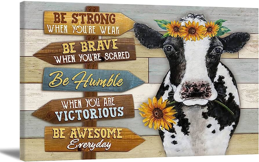 A charming cow with sunflower crown beside rustic wooden signs bearing inspirational quotes like "Be Strong When You're Weak".