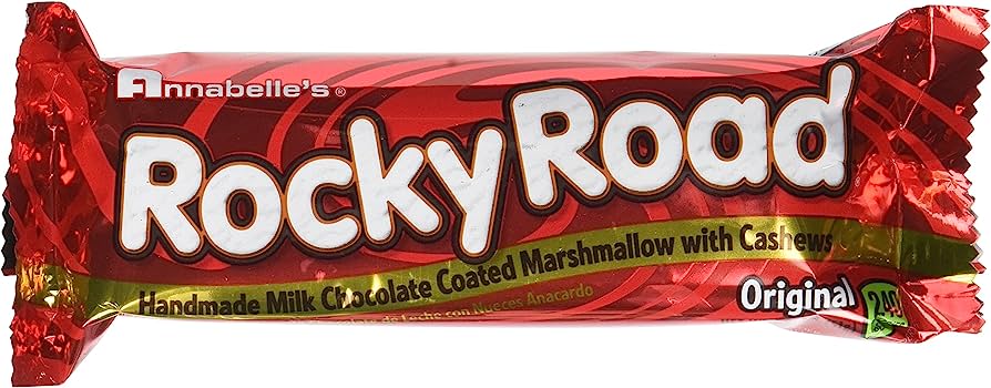 Annabelle's Rocky Road candy bar: milk chocolate-coated marshmallow with cashews, original flavor, red foil wrapper.
