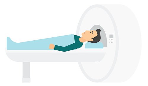 Man lying on MRI scanner table undergoing a medical imaging procedure.