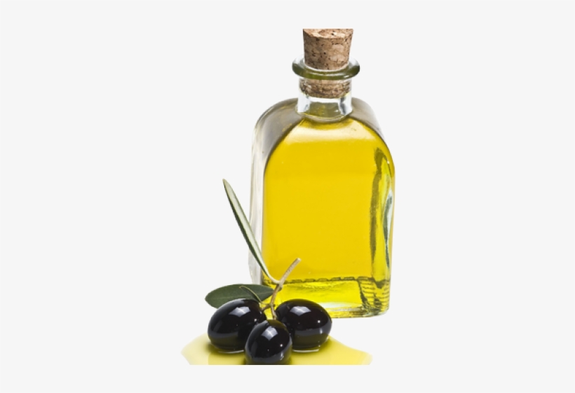 Clear glass bottle of golden olive oil with cork stopper, accompanied by three black olives and a green leaf on white background.