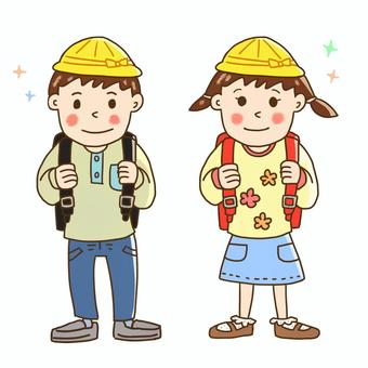 Two smiling children wearing yellow safety helmets and backpacks, ready for school or an outdoor activity.