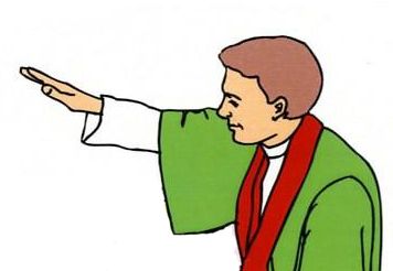 Priest in green vestment and red stole extending hand in blessing gesture.