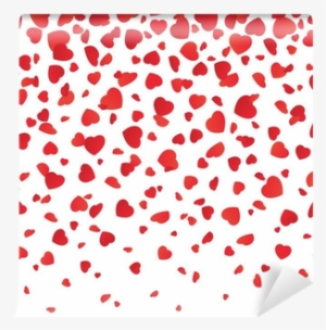 Red heart-shaped confetti scattered on a white background, evoking romance and celebration.