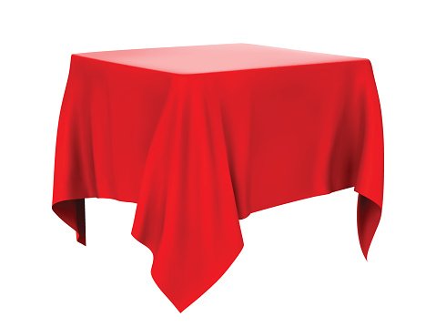 A square table draped in a vibrant red cloth with elegant folds and draping corners, isolated on white background.