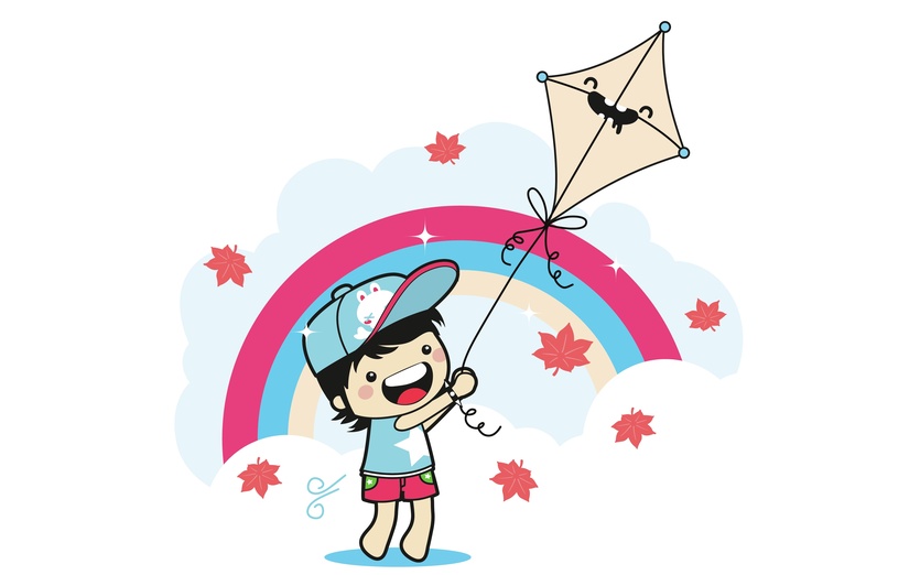 Happy child flying a smiling kite under a rainbow with autumn leaves and clouds.