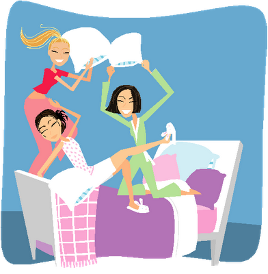 Three smiling women having a playful pillow fight on a bed during a sleepover.