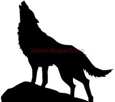 Silhouette of a howling wolf standing on a rocky outcrop against a white background.