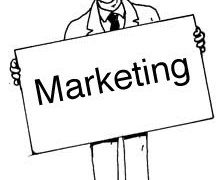 Businessperson holding a sign that reads "Marketing" in bold black text on white background.