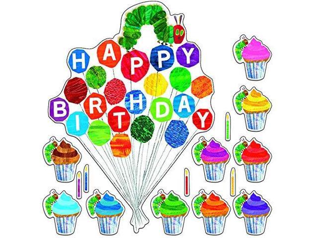 The Very Hungry Caterpillar-themed birthday party decoration with "Happy Birthday" balloons, cupcakes, and candles.