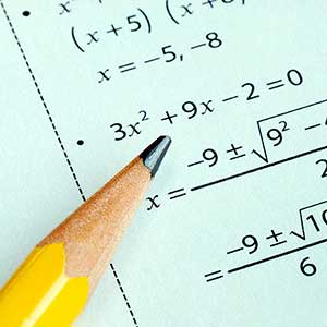Algebra 1 title graphic with mathematical symbols and diagrams on a blue background.