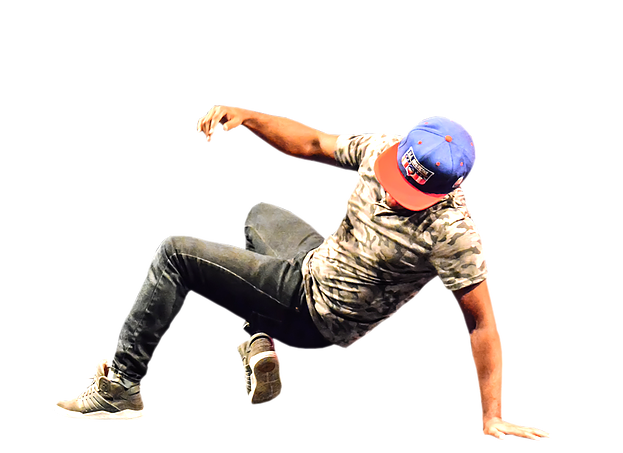 Breakdancer in camouflage shirt and blue cap performing a dynamic floor move mid-motion.