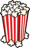 A classic red-and-white striped popcorn bucket overflowing with fluffy popcorn, with a few kernels spilled at the base.