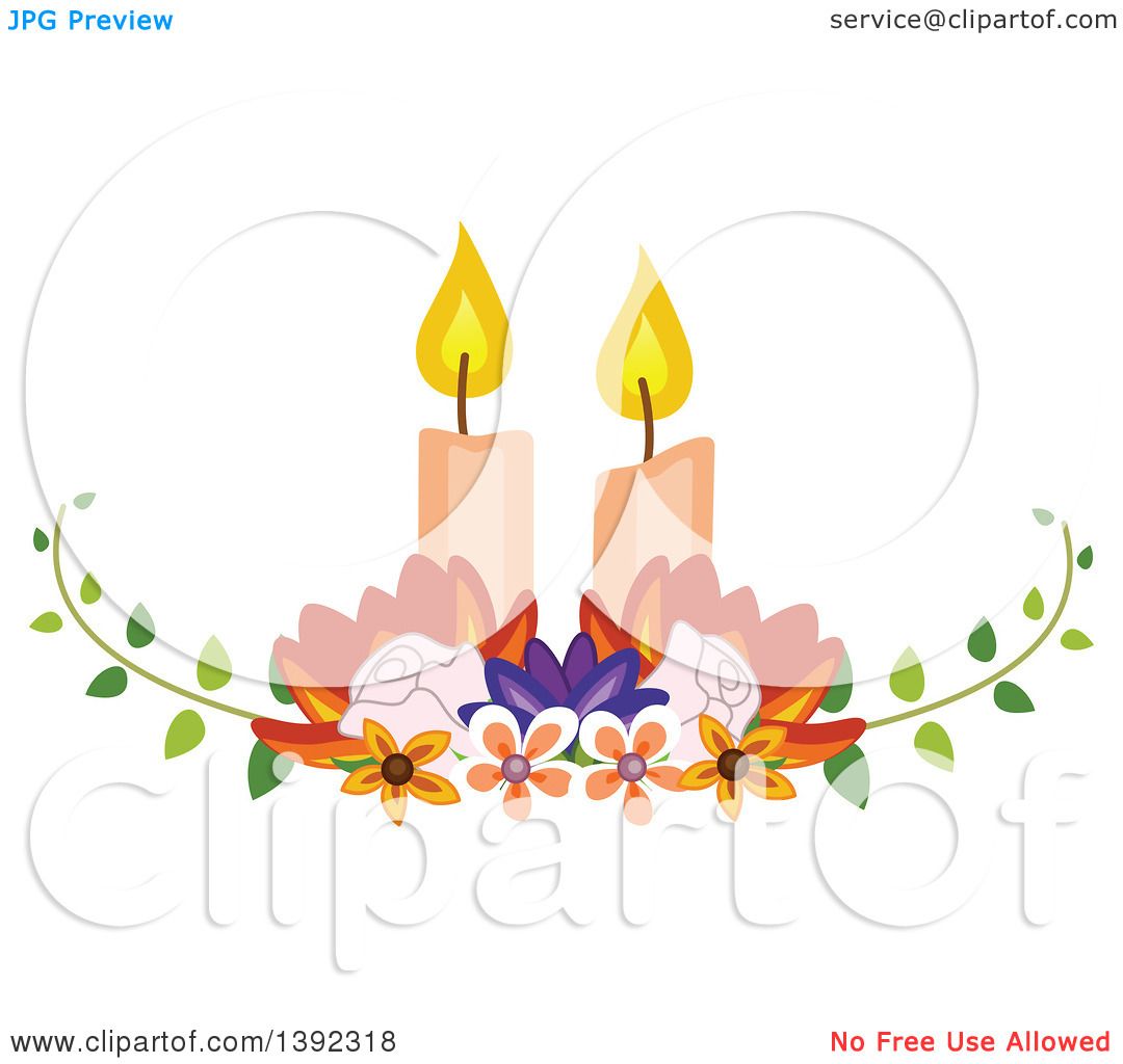 Two lit candles surrounded by colorful flowers and green vines in a decorative floral arrangement.