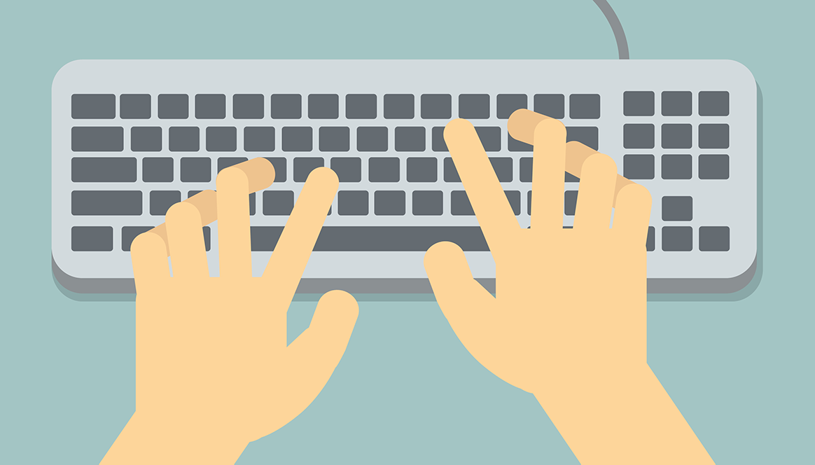 Hands typing on a standard computer keyboard from overhead view.