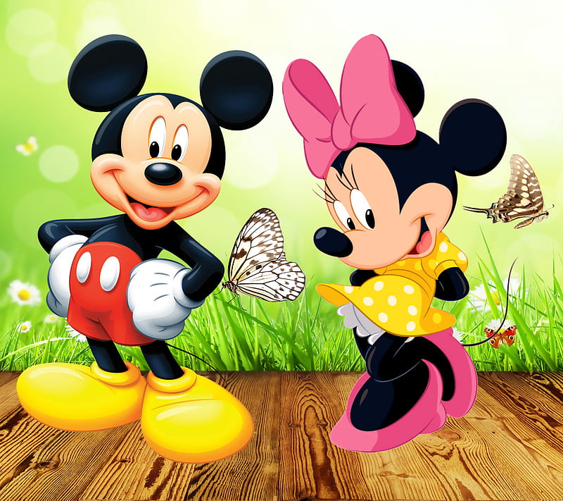 Mickey and Minnie Mouse smiling in a sunny garden with butterflies and daisies.