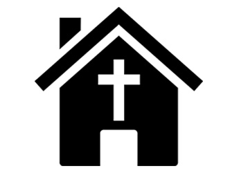 Black silhouette of a church with a cross on the front facade and a chimney on the roof.