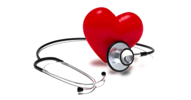 A red heart with a stethoscope wrapped around it, symbolizing cardiovascular health and medical care.