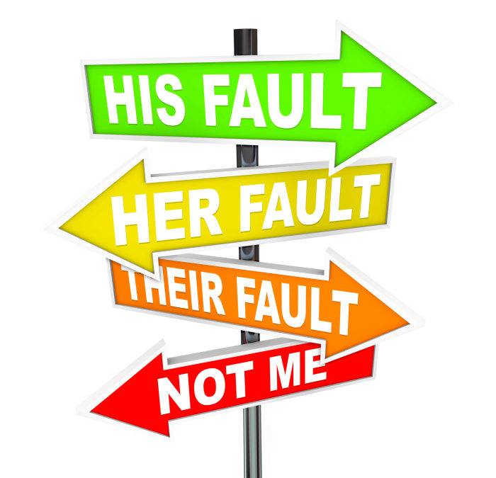 Four colorful directional signs pointing different ways, labeled "His Fault", "Her Fault", "Their Fault", and "Not Me".