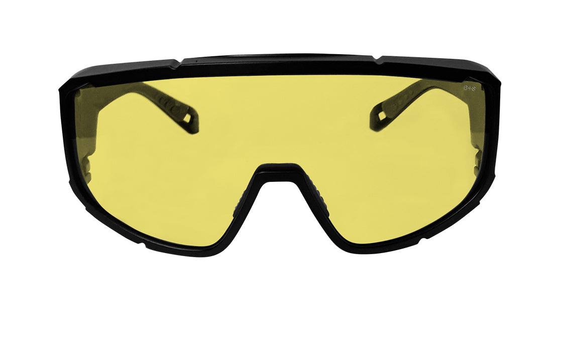 Yellow-tinted safety goggles with black frame, designed for eye protection and enhanced contrast in low-light conditions.