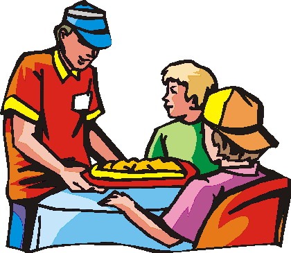 A fast-food worker in a red uniform serves fries to two children seated at a table.