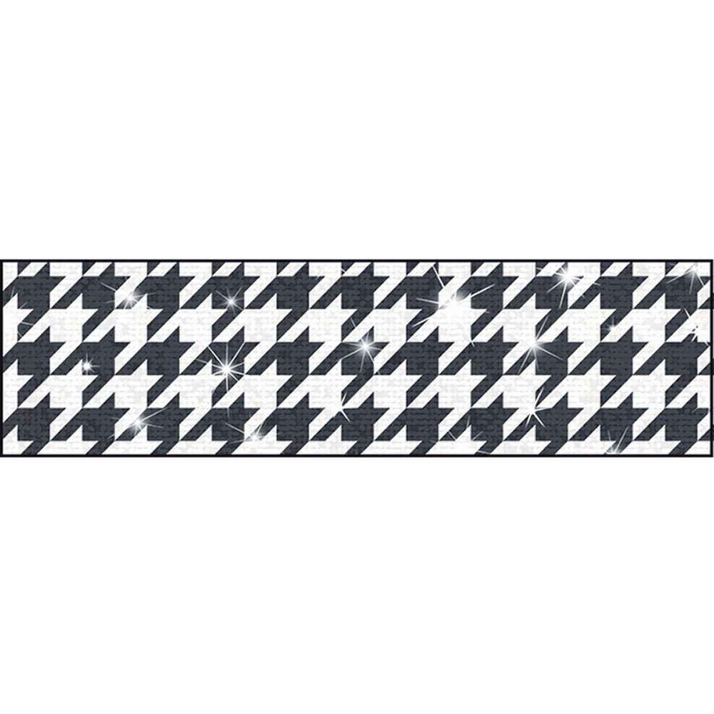 Black and white houndstooth pattern with sparkling highlights on a rectangular banner.