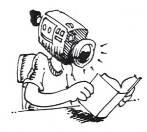 A cartoon person with a video camera for a head reads a book, symbolizing media literacy or content creation.