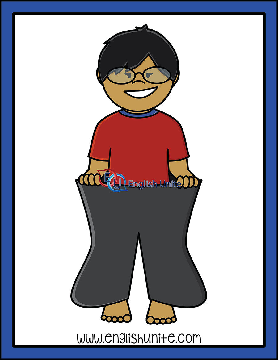 Smiling boy with glasses holding oversized pants, indicating weight loss or growth.
