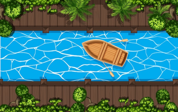 Top-down view of a wooden rowboat floating on blue water in a narrow canal, flanked by wooden docks and lush greenery.