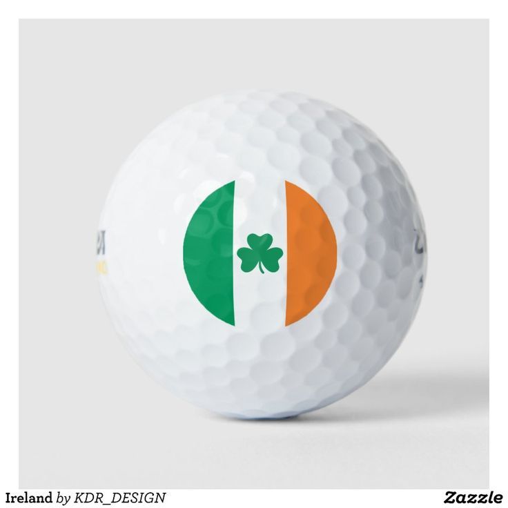 White golf ball featuring the Irish flag with green, white, and orange vertical stripes and a centered green shamrock.